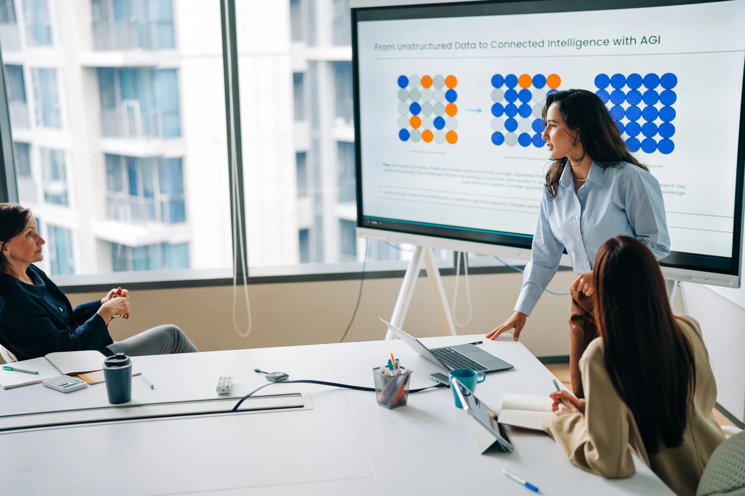 Business team attending an artificial intelligence strategy presentation